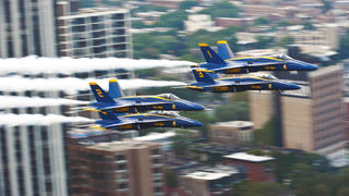 Watch And Hear The Blue Angels Thread Between High-Rises In Chicago